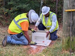 Technicians installing high-speed internet